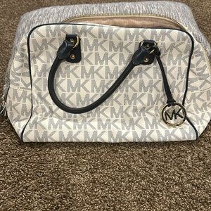 Michael Kors navy and white bag.